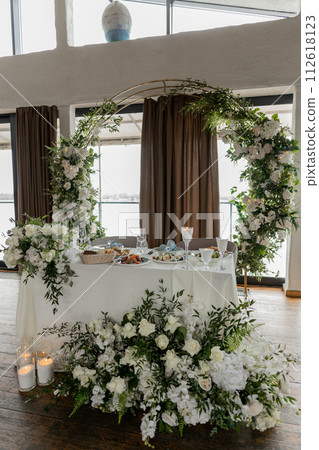 Romantic wedding table with floral arch elegance 112618123