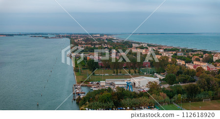 Aerial view of the Lido de Venezia island in Venice, Italy. The island between Venice and Adriatic sea. 112618920