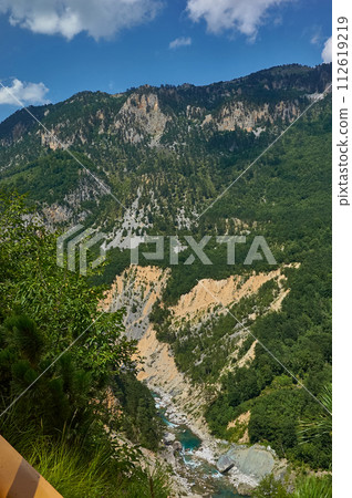 Tara riverbed and Montenegro mountains. 112619219