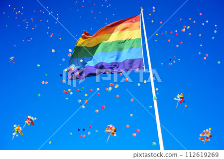Balloons, blue sky and rainbow flag 112619269