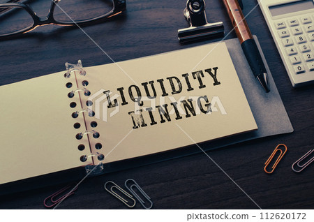 I have a notepad on my laptop with the word liquidity mining on it. It's an eye-catching image. I have a notepad on my laptop with the word liquidity mining on it. It's an eye-catching image. 112620172