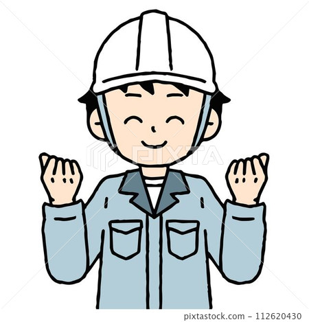 A man wearing work clothes is doing a fist pump 112620430