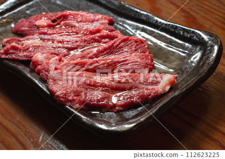 Yakiniku, beef cheek, fresh raw meat, red meat, overhead view 112623225