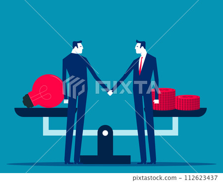 Two business person shake hands to make a deal on the background of scales 112623437