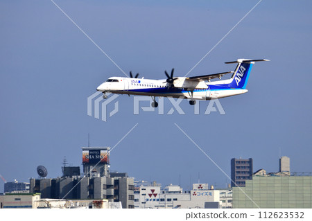 Osaka International Airport ANA Bombardier DHC8-Q400 propeller plane landing preparation Skypark 112623532