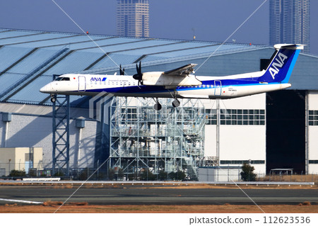 Osaka International Airport ANA Bombardier DHC8-Q400 propeller plane landing preparation Skypark 112623536