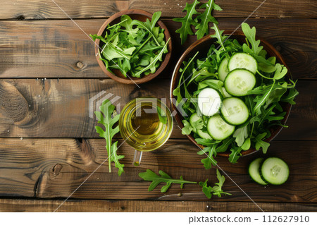 Light vitamin salad of cucumber and arugula Light vitamin salad of cucumber and arugula 112627910