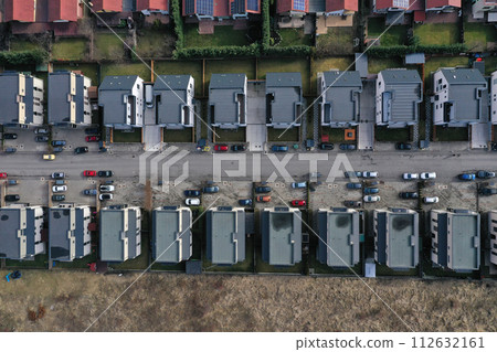 European urban suburban cityscape, aerial view of residential houses and yards European urban suburban cityscape, aerial view of residential houses and yards 112632161