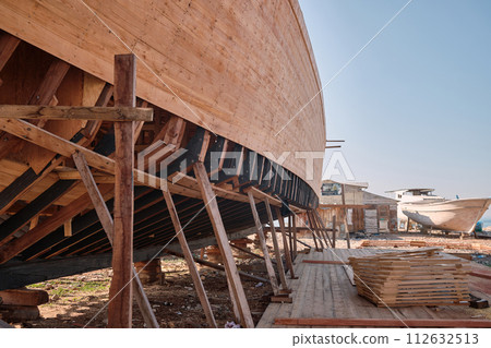 Yacht at wharf under construction 112632513