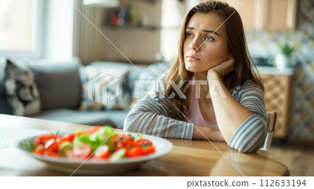 Dieting healthy young woman, having temptation hungry of food Dieting healthy young woman, having temptation hungry of food 112633194