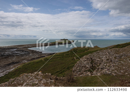 Summer landscape of Worm s Head and Rhosilli Bay 112633498