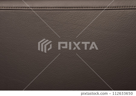 Texture of full grain brown leather with stitching on top 112633650