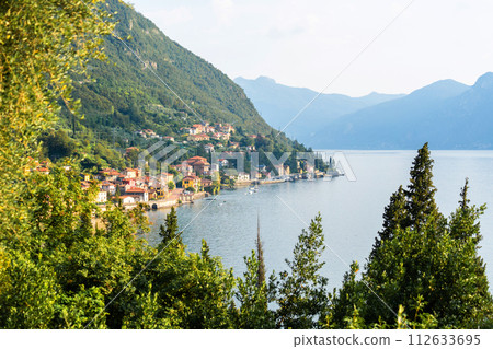 Mountain landscape, picturesque mountain lake in the summer morning, panorama. Como, Italy 112633695