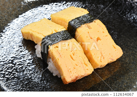 Egg nigiri sushi 2 pieces black bag Egg nigiri sushi 2 pieces black bag 112634067