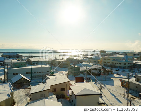 Monbetsu city and the Sea of Okhotsk seen from Monbetsu Prince Hotel 112635358