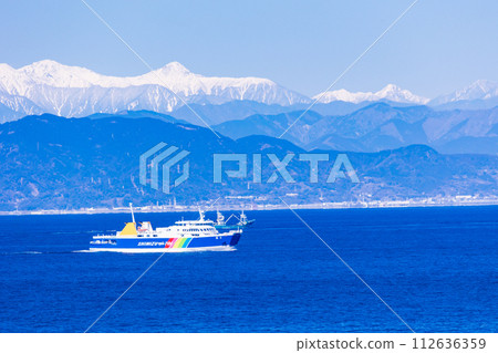 (Shizuoka Prefecture) Suruga Bay Ferry heading towards Toi Port with the snow-covered Southern Alps in the background (Shizuoka Prefecture) Suruga Bay Ferry heading towards Toi Port with the snow-covered Southern Alps in the background 112636359