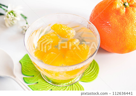 Iyokan jelly made in a glass 112636441