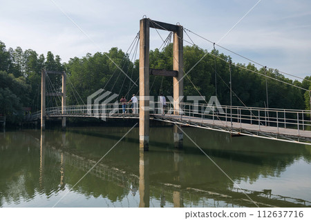 people across Raksamae bridge to mangrove forest, Rayong, Thailand people across Raksamae bridge to mangrove forest, Rayong, Thailand 112637716