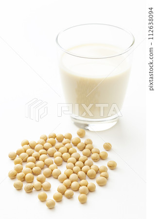 Soy milk and soybeans on white background 112638094
