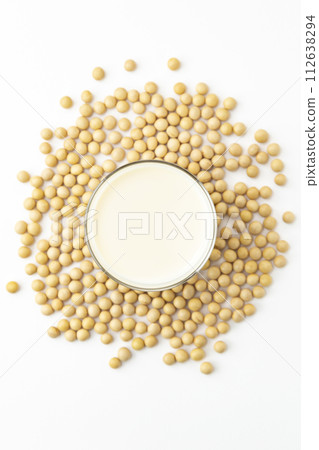 Soy milk and soybeans on white background 112638294