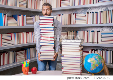 school education with man teacher. education and knowledge. back to school. teachers day. teachers  112640289