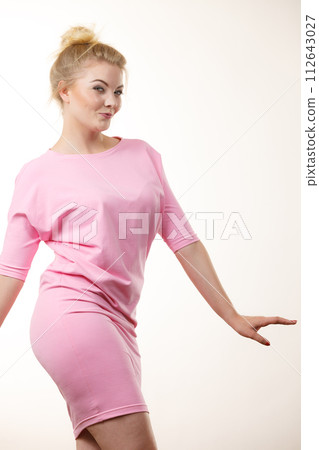Woman wearing pink elegant dress Woman wearing pink elegant dress 112643027