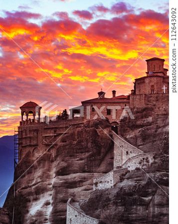 Sunset over Varlaam monastery in Meteora, Greece 112643092