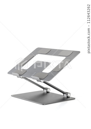 Aluminum laptop stand, to improve ventilation on a white background in isolation 112643262