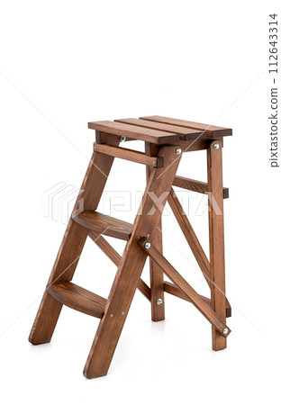 Small old-style decorative folding wooden ladder isolated on white background. wooden stairs Small old-style decorative folding wooden ladder isolated on white background. wooden stairs 112643314