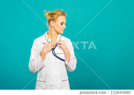 woman medical doctor with stethoscope woman medical doctor with stethoscope 112643895