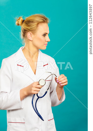 woman medical doctor with stethoscope woman medical doctor with stethoscope 112643897