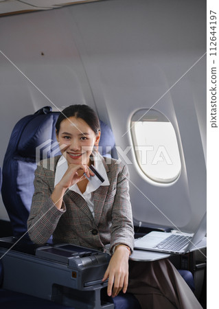 Woman Writing Notebook Plane Flying Concept 112644197