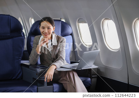 Woman Writing Notebook Plane Flying Concept Woman Writing Notebook Plane Flying Concept 112644223