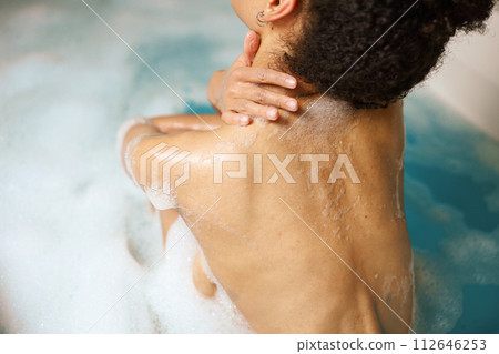 Happy woman bathing in bathtub water, leisure, and relaxation Happy woman bathing in bathtub water, leisure, and relaxation 112646253