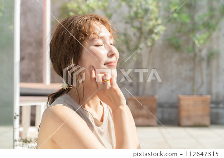 Beauty, UV protection, skin care, sunscreen, anti-aging female image Beauty, UV protection, skin care, sunscreen, anti-aging female image 112647315