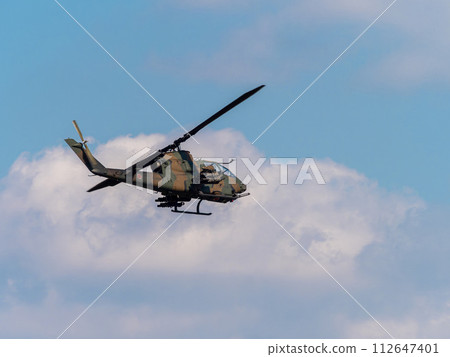 JGSDF anti-tank helicopter AH-1S Cobra flying over Yao Garrison 112647401