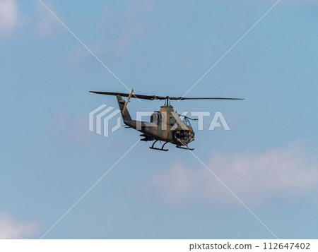 JGSDF anti-tank helicopter AH-1S Cobra flying over Yao Garrison 112647402