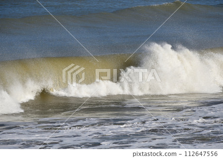 Crumbling waves 112647556