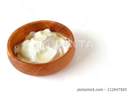 Drained yogurt with honey Greek yogurt Drained yogurt with honey Greek yogurt 112647885