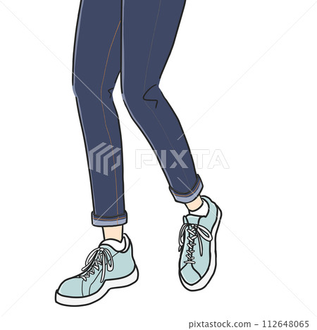 A stylish and sporty woman wearing denim pants and sneakers walking with light steps. 112648065