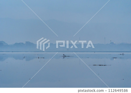 Reflection of lake with sunset sky. Nature landscape background. Reflection of lake with sunset sky. Nature landscape background. 112649586
