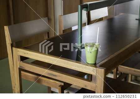Matcha latte or iced green tea Matcha latte or iced green tea 112650231