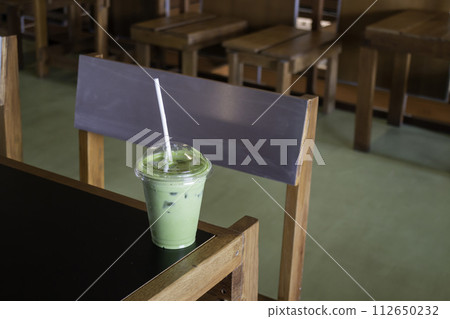 Matcha latte or iced green tea Matcha latte or iced green tea 112650232