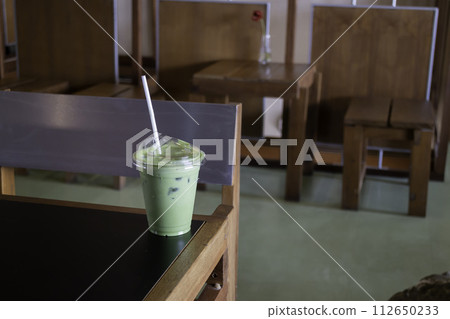 Matcha latte or iced green tea Matcha latte or iced green tea 112650233