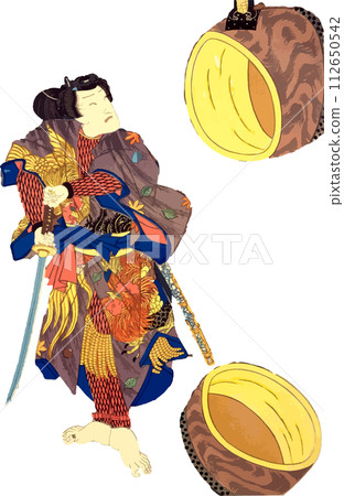 A skilled swordsman who cuts a Japanese drum in half 112650542