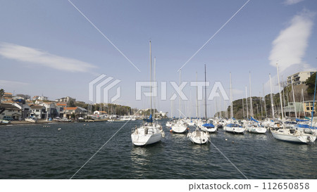 Yachts anchored at the yacht harbor Yachts anchored at the yacht harbor 112650858
