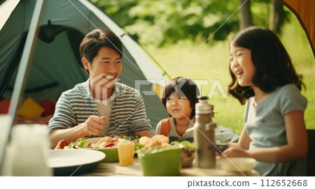 Camping and family, Japanese family eating at the campsite 112652668