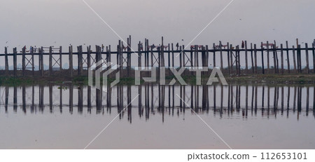 U Bein Bridge with lake, Wooden Bridge in Mon village, Myanmar or Burma, Asia. 112653101