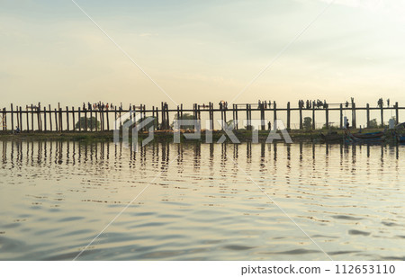 U Bein Bridge with lake, Wooden Bridge in Mon village, Myanmar or Burma, Asia. U Bein Bridge with lake, Wooden Bridge in Mon village, Myanmar or Burma, Asia. 112653110
