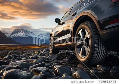SUV car on top of mountain with beautiful scenery, closeup wheel, Generate Ai. 112653213